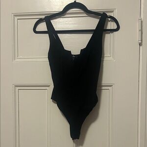 Lulu’s Black Sleeveless Bodysuit